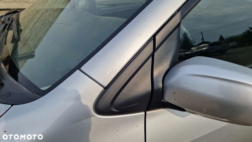 MAZDA MPV II ZAŚLEPKA BŁOTNIKA TRÓJKĄT LEWY PRZÓD