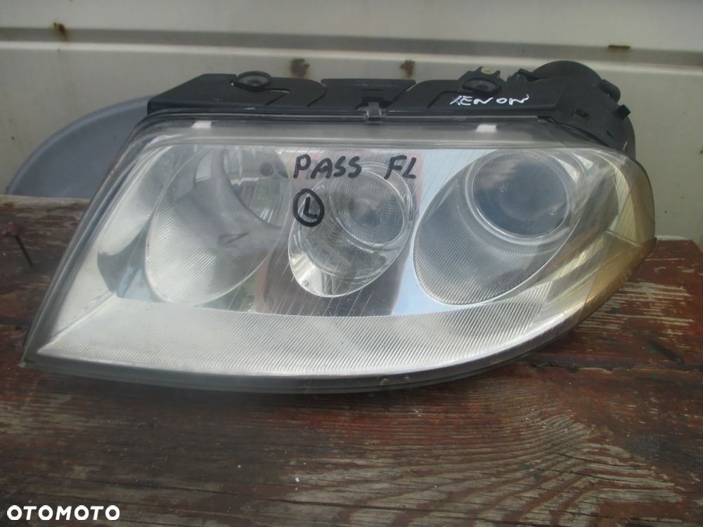 lampa lewa Passat B5 LIFT Xenon Hella Europa - 1