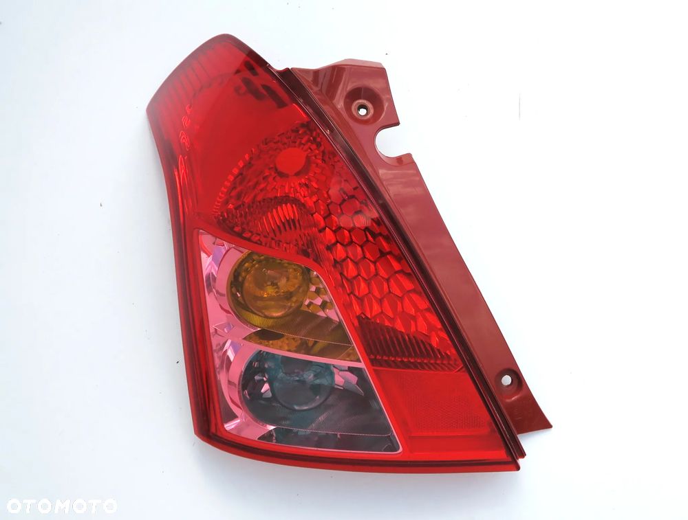 SUZUKI SWIFT 3 III Lift 2008 - 2010 Lampa tył lewa L ORYGINAŁ OE - 7