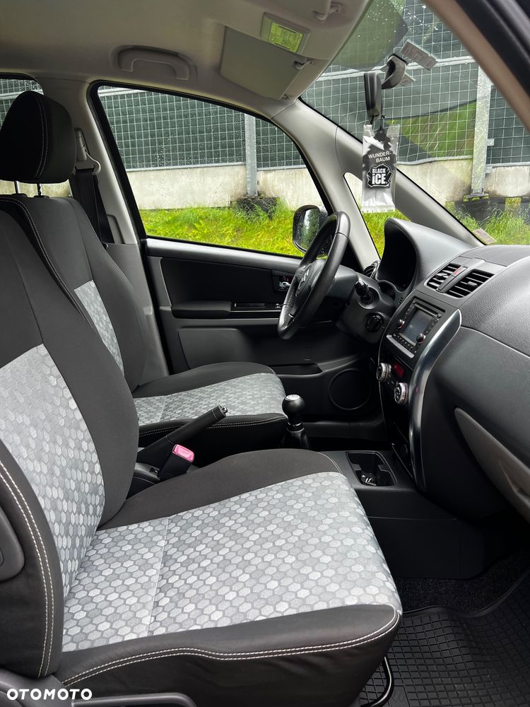 Suzuki SX4 1.6 Comfort Plus - 7