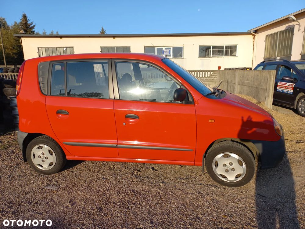 Hyundai Atos 1.0 B 03r Kolor TR blotnik przedni prawy - 1
