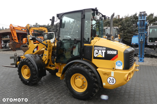 Caterpillar 906M Z NIEMIEC BIEGI DROGOWE PŁYWAJĄCA ŁYZKA