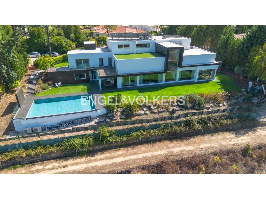 Moradia T5+2 com piscina infinita na Quinta do Peru Golf & Countryclub - Grande imagem: 2/60