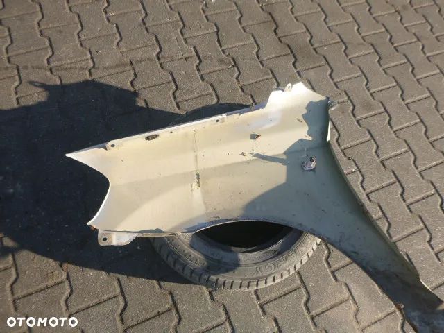 BŁOTNIK PRAWY PRZÓD PRAWY PRZEDNI CHEVROLET AVEO II T250 07-11 - 17
