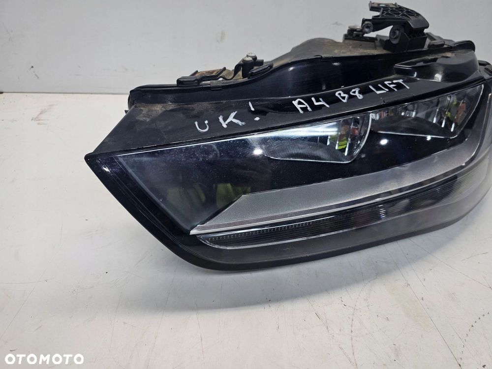 REFLEKTOR LEWY AUDI A4 B8 LIFT UK 8K0941003M - 2