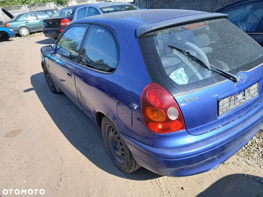 toyota corolla E11 lift 8L5 HB fotel fotele kanapa deska kokpit podsufitka boczek boczki klamka - 2