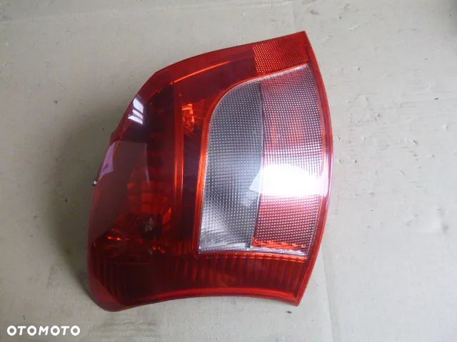 LAMPA LEWY TYŁ LEWA TYLNA TOYOTA YARIS II 5D 05-09 - 3