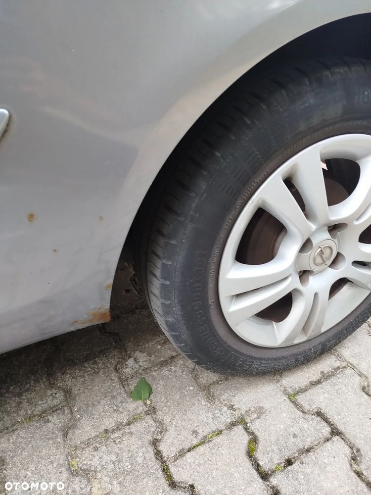 Opel Corsa 1.4 16V Enjoy - 9