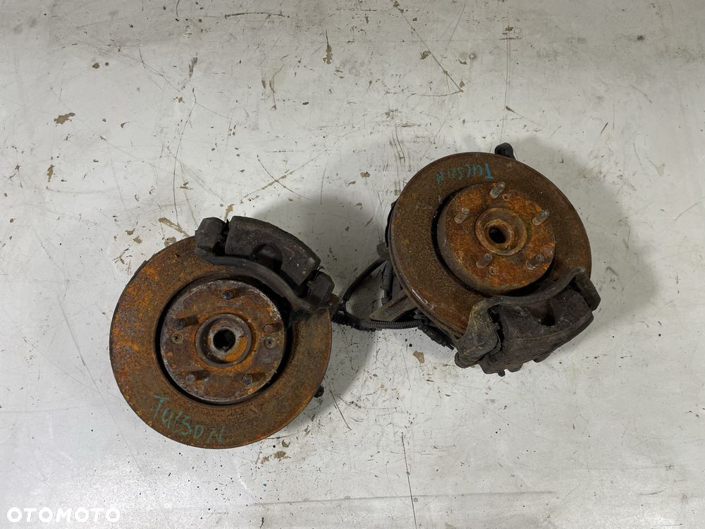 HYUNDAI TUCSON 2.0 CRDI ZWROTNICA PIASTA ZACISK TARCZA LEWA PRAWA PRZÓD PRZEDNIA - 1