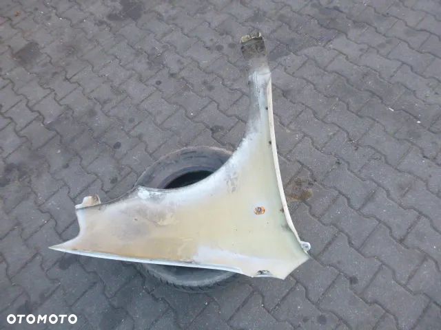 BŁOTNIK LEWY PRZÓD LEWY PRZEDNI DAEWOO KALOS KOLOR 95U - 12