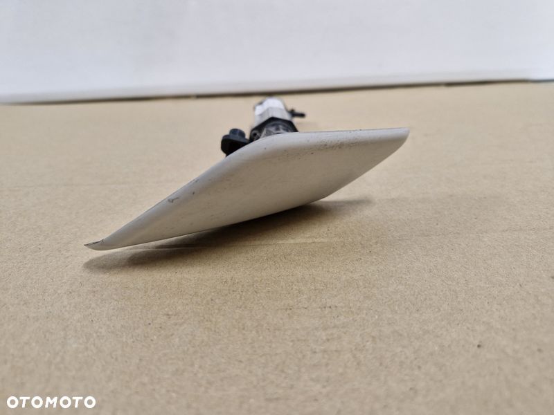 VOLVO S60 2 II SPRYSKIWACZ LAMPY REFLEKTORA PRAWY PRZÓD PRZEDNI 2308457 - 9