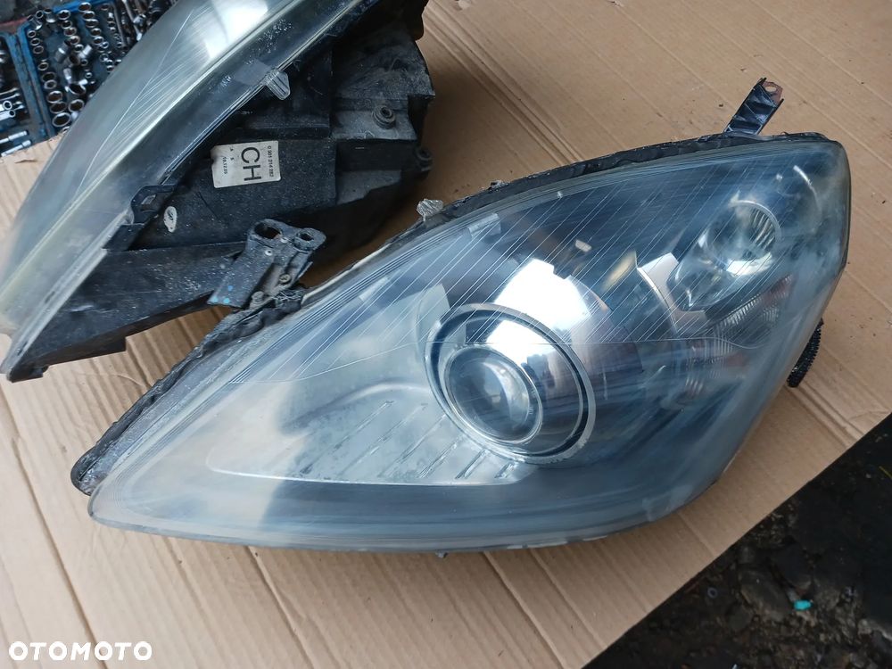 Lampa Przednia Prawa Lewa Opel Zafira B Bi-Xenon Skrętny EU KOMPLET 24451045RH 24451044LH - 2
