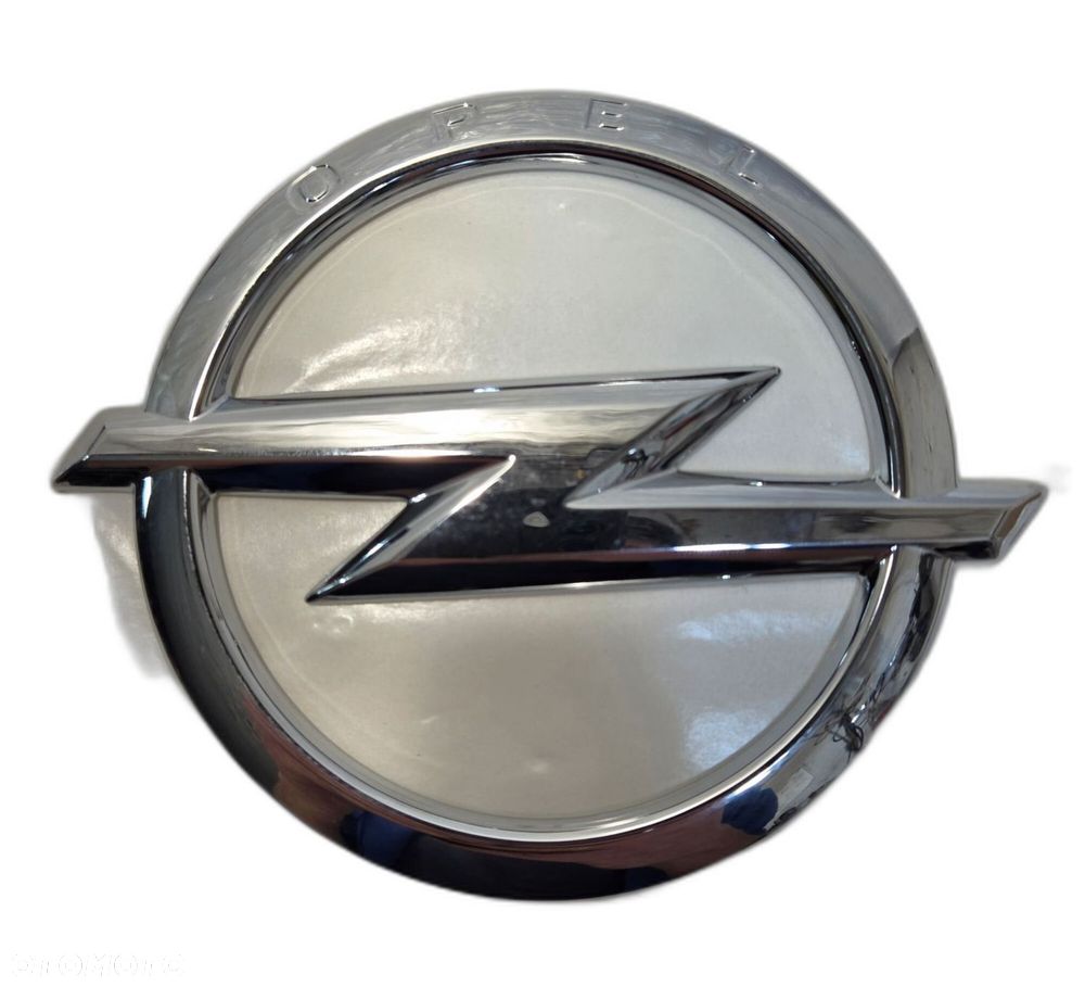OPEL ASTRA IV J HB  EMBLEMAT ZNACZEK LOGO KLAPY TYŁ 13321629 NOWY ORYINAŁ - 1