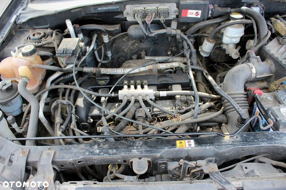 Ford Maverick 2006 2.3i Terenowy (MASKA, ZDERZAK, LAMPA, BŁOTNIK, DRZWI, SZYBA, FOTEL) - 7