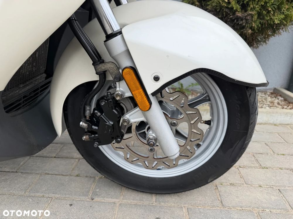Suzuki Burgman - 9