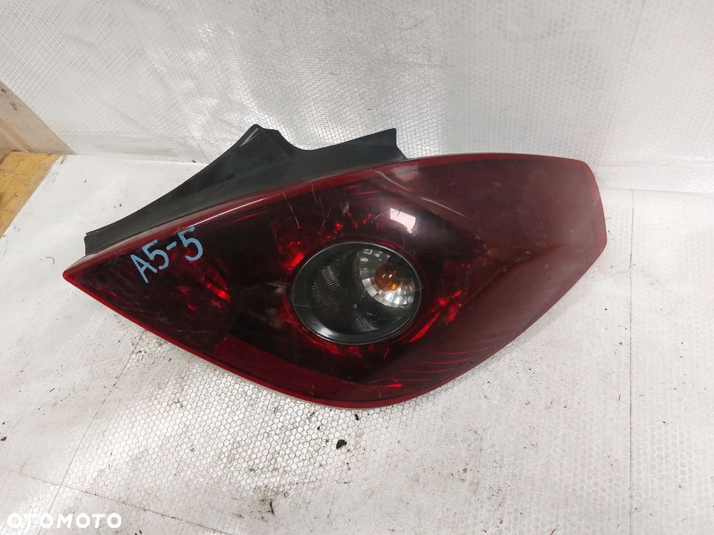 .  LAMPA TYL TYLNA PRAWA OPEL CORSA D !3D ! ! CIEMNA ! - 2