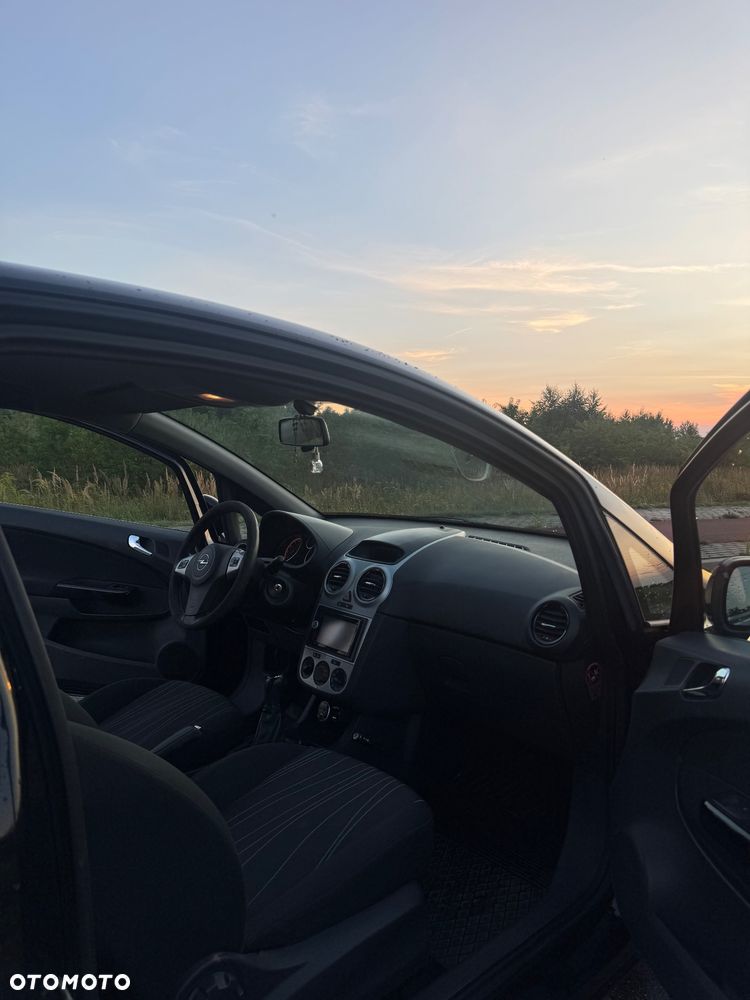 Opel Corsa 1.4 16V Enjoy - 8