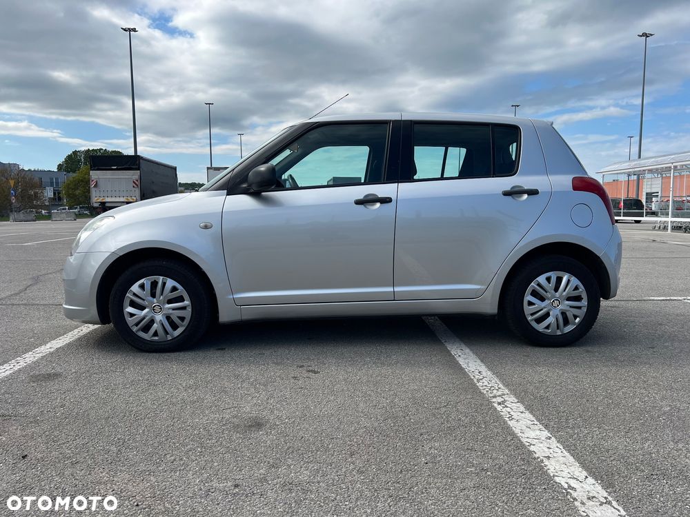 Suzuki Swift 1.3 Club - 3