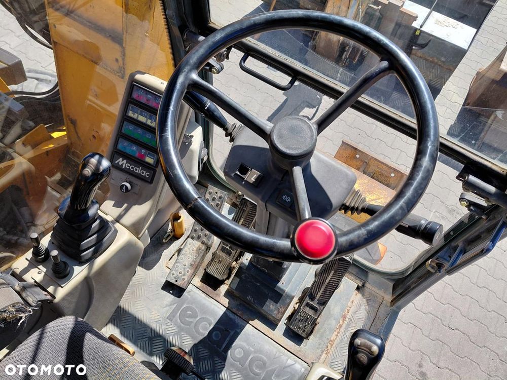 Mecalac 12MX - 23