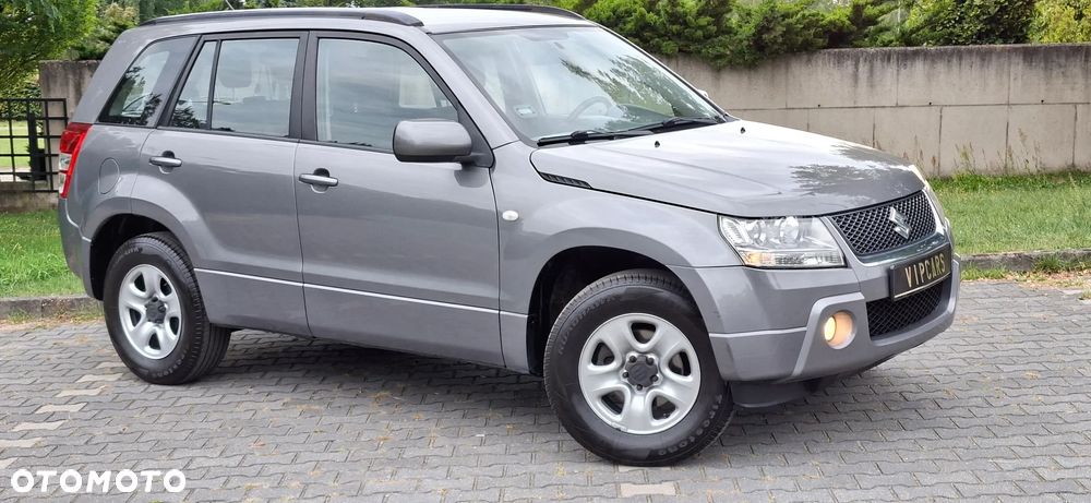 Suzuki Grand Vitara 2.0 Comfort + Family - 7