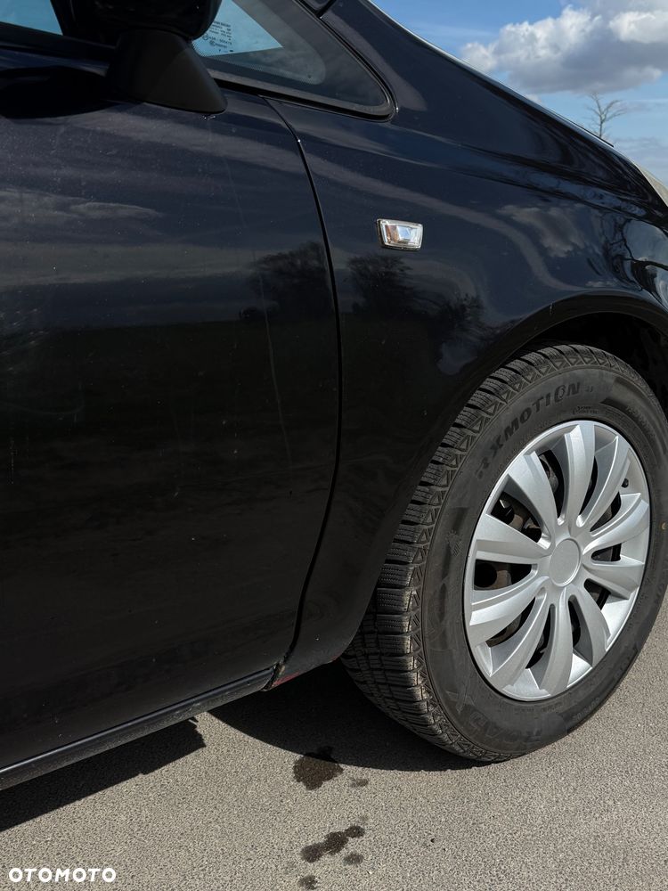 Opel Corsa 1.2 16V Cosmo - 7