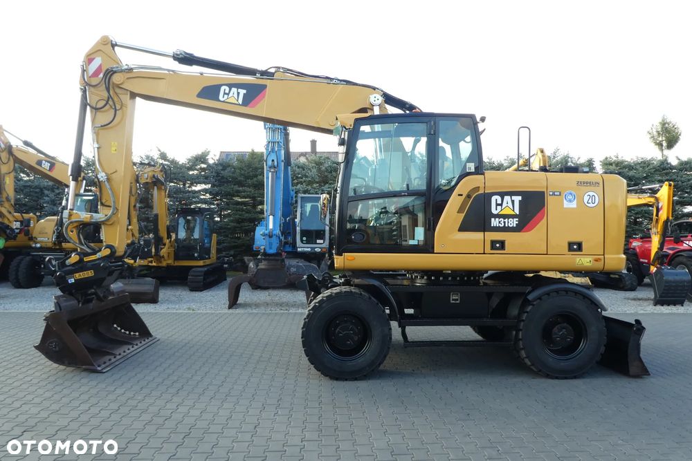 Caterpillar M 318F Z NIEMIEC