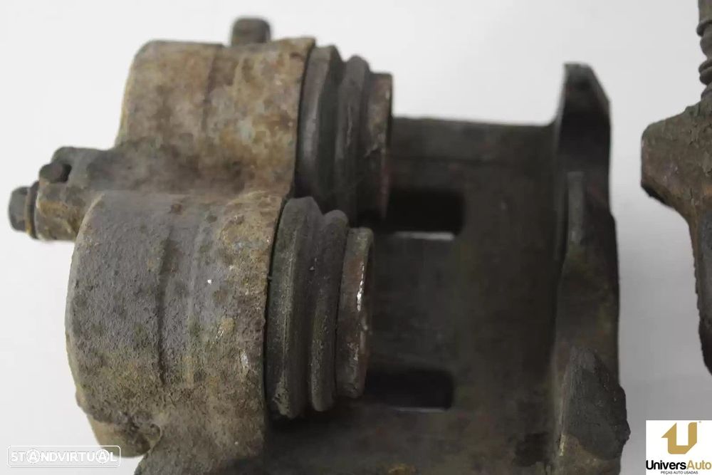 PINÇA TRAVÃO FRONTAL ESQUERDA NISSAN NP300 NAVARA 2006 -D.I. - 1