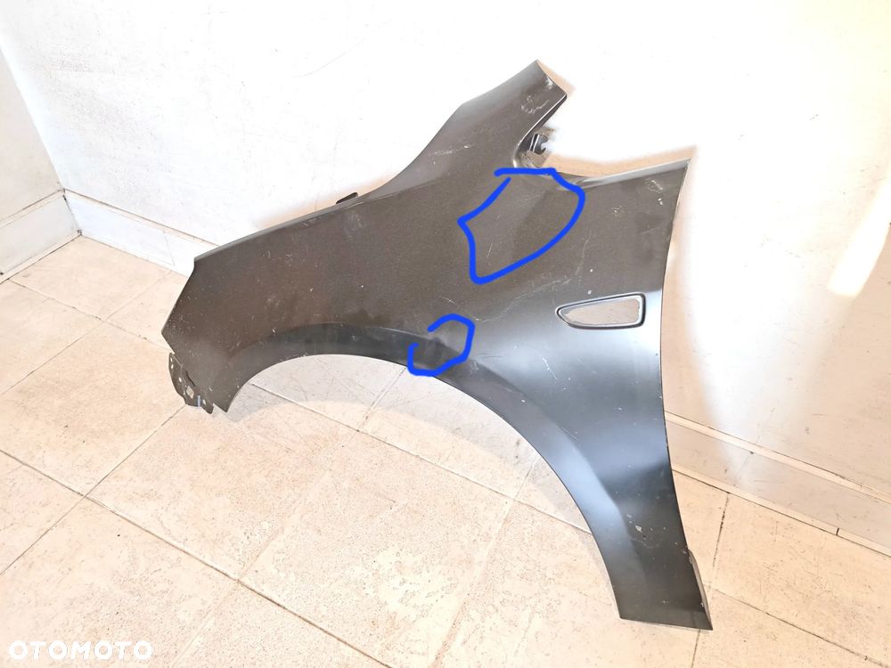 BŁOTNIK LEWY PRZÓD PRZEDNI OPEL ASTRA J 4 IV