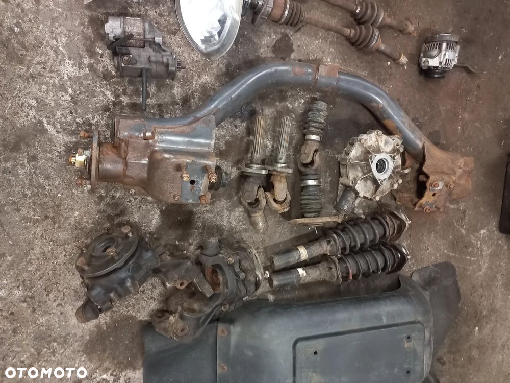 Części Kubota RTV900 silnik,skrzynia,most,zawieszenie,ATV,4x4,1140,1100c,x1110,koła,rama,maska,kabina - 17