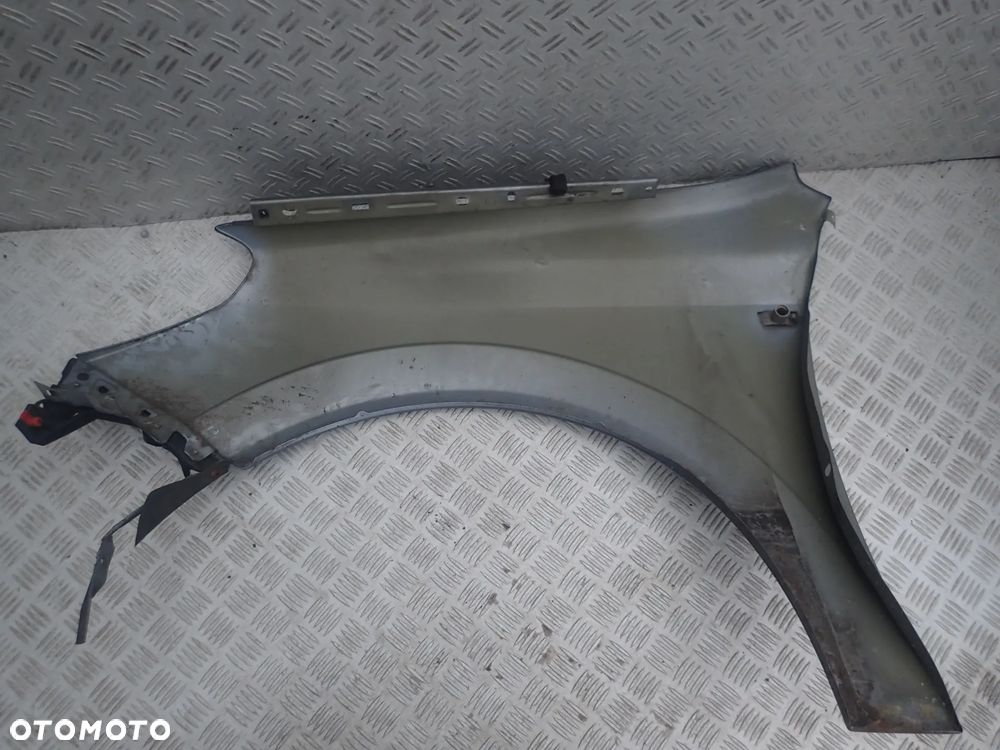 BŁOTNIK PRAWY PRZÓD OPEL ASTRA III - 7