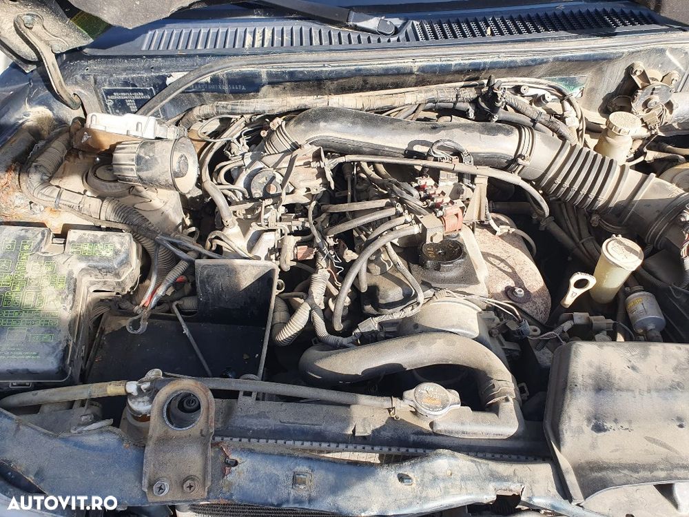 bara spate capota portbagaj haion mocheta rulou oglinda stanga dreapta Mitsubishi Pajero Pinin motor 1.8 benzina dezmembrez - 7