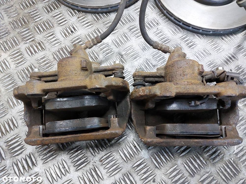 TARCZE HAMULCOWE PRZÓD + KLOCKI + ZACISKI SKODA FABIA II 1.9 TDI - 2
