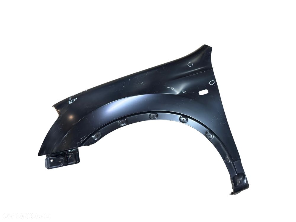 BŁOTNIK LEWY NISSAN QASHQAI 2007-