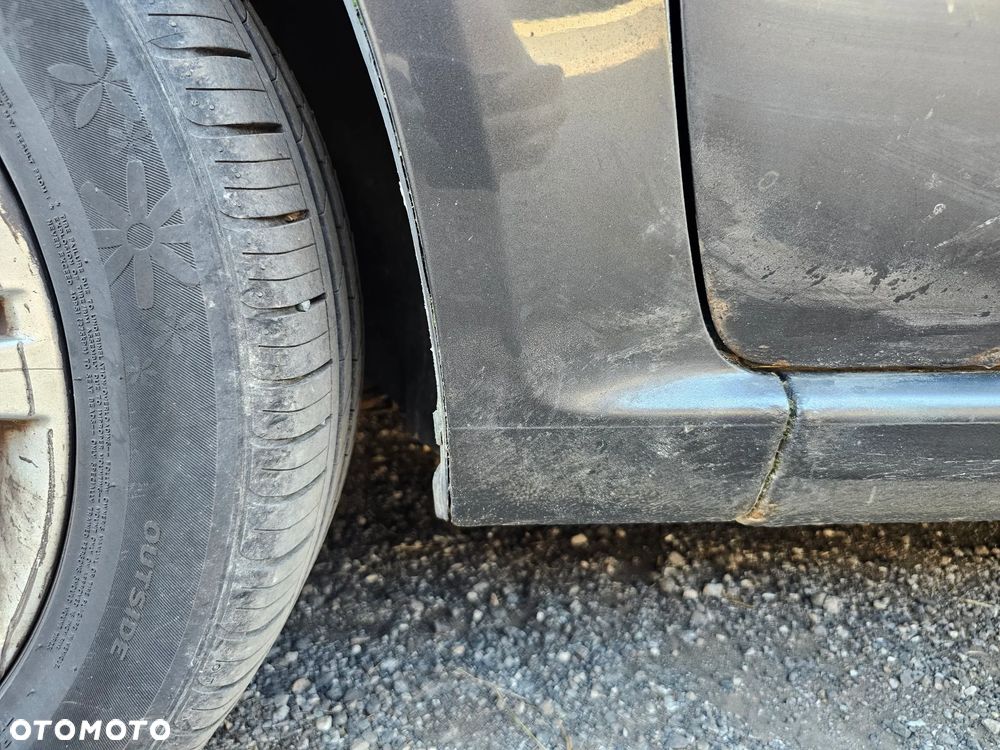 BŁOTNIK LEWY PRZÓD LEWY PRZEDNI OPEL ZAFIRA B Z177 - 7