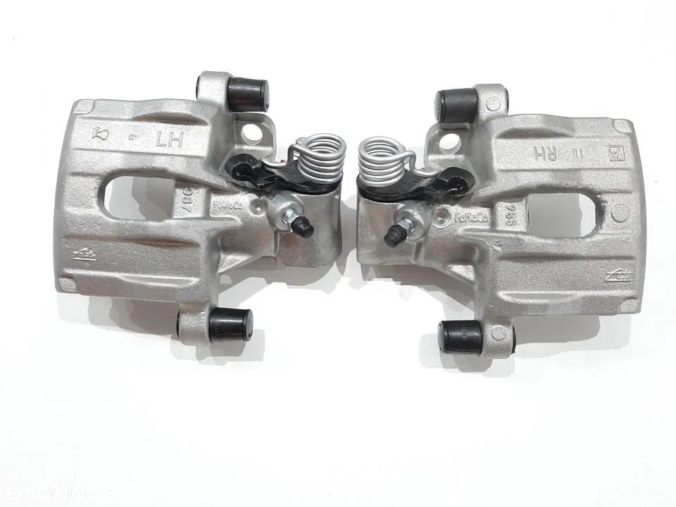 Zacisk tył Lewy Prawy Volvo v50 S40 II C30 C 70 II Ford Focus I II C-Max Mazda 3 - 2