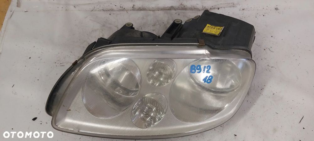 .  PRZOD PRZEDNIA LAMPA LEWA  VOLKSWAGEN TOURAN / CADDY - 2