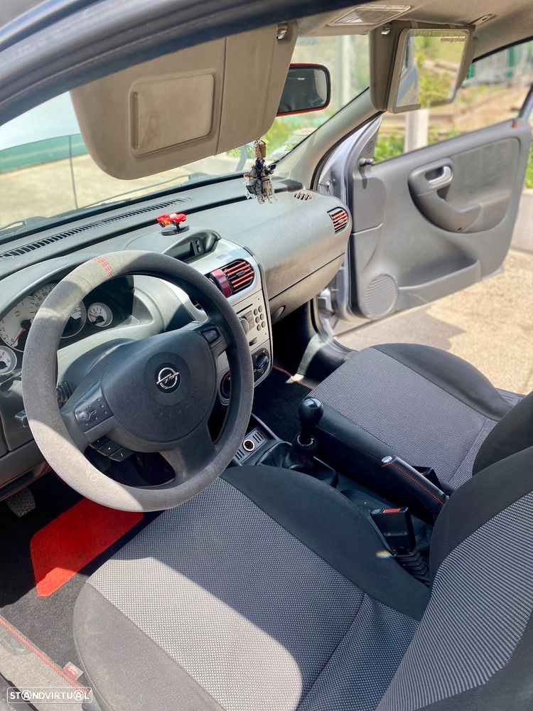 Opel Corsa 1.2 16V Cosmo - 8