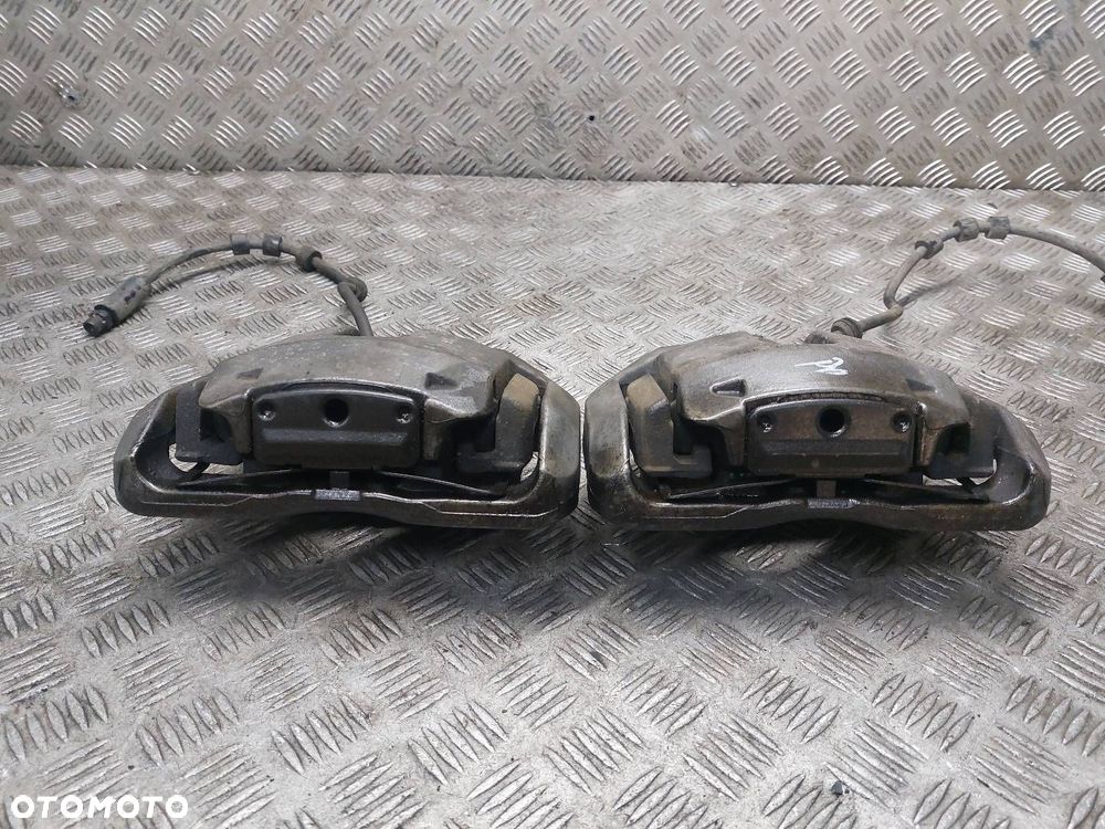 ZACISK HAMULCOWY LEWY PRZÓD + PRAWY PRZÓD BMW E61 520D - 2