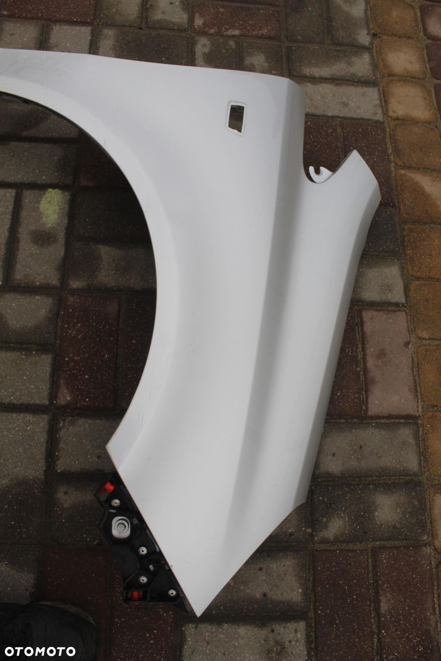 BŁOTNIK PRAWY PRZÓD Z157 OPEL CORSA D - 2