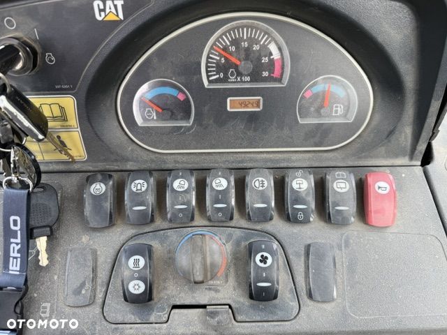 Caterpillar 428E - 7