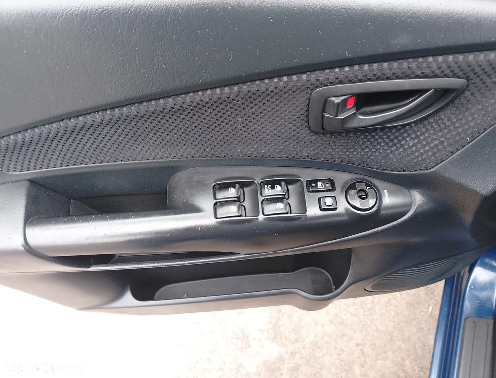 Hyundai Tucson 2.0 Comfort 2WD - 19