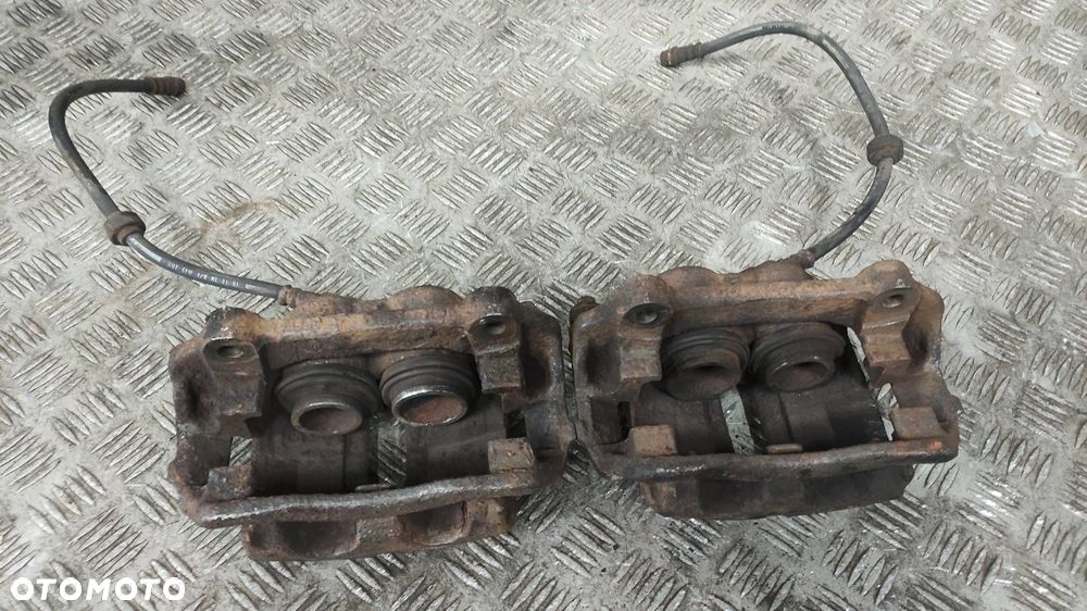 ZACISK HAMULCOWY PRAWY PRZÓD + LEWY PRZÓD  RENAULT TRAFIC II - 2