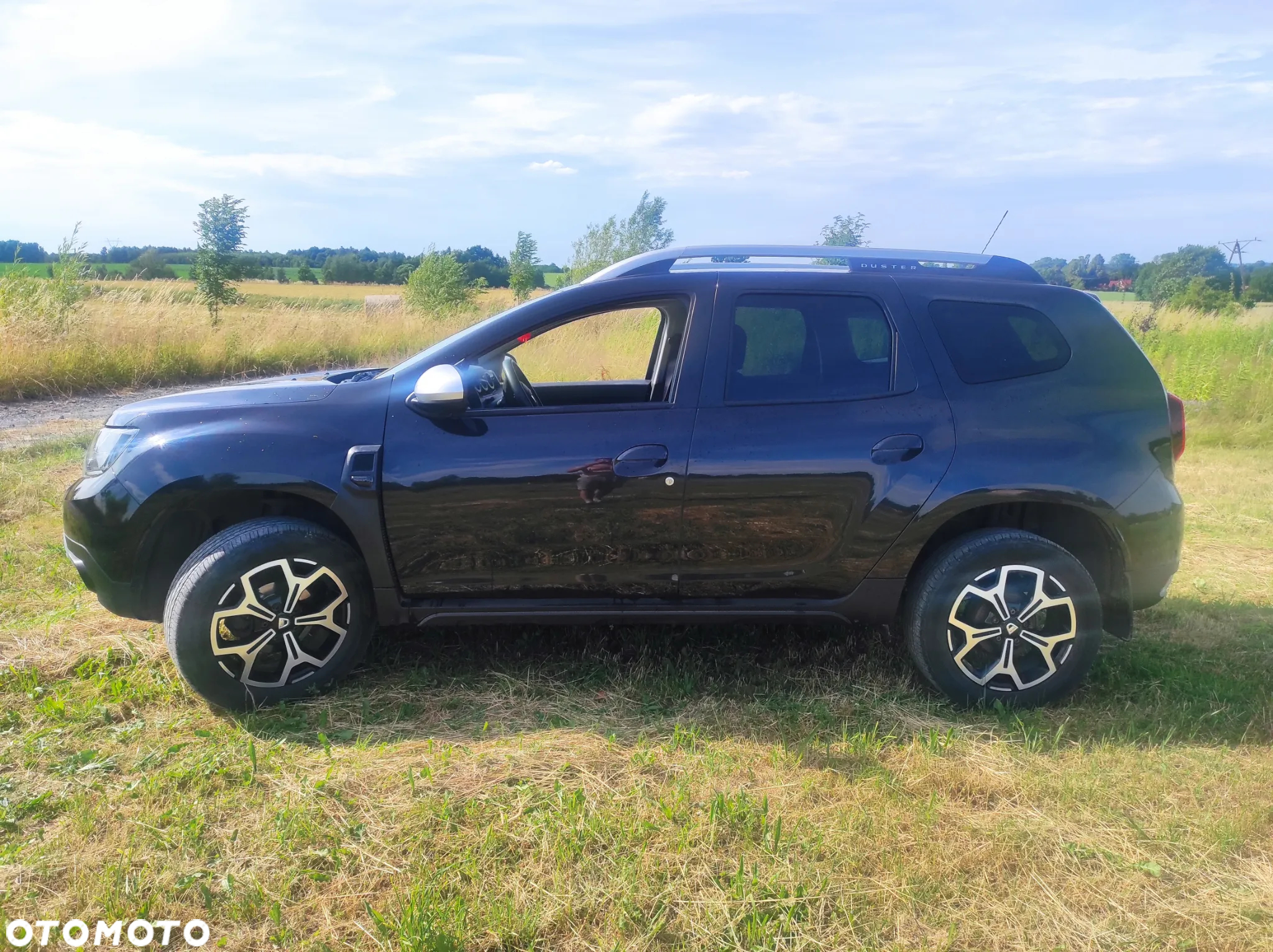 Dacia Duster 1.6 SCe Prestige - 4