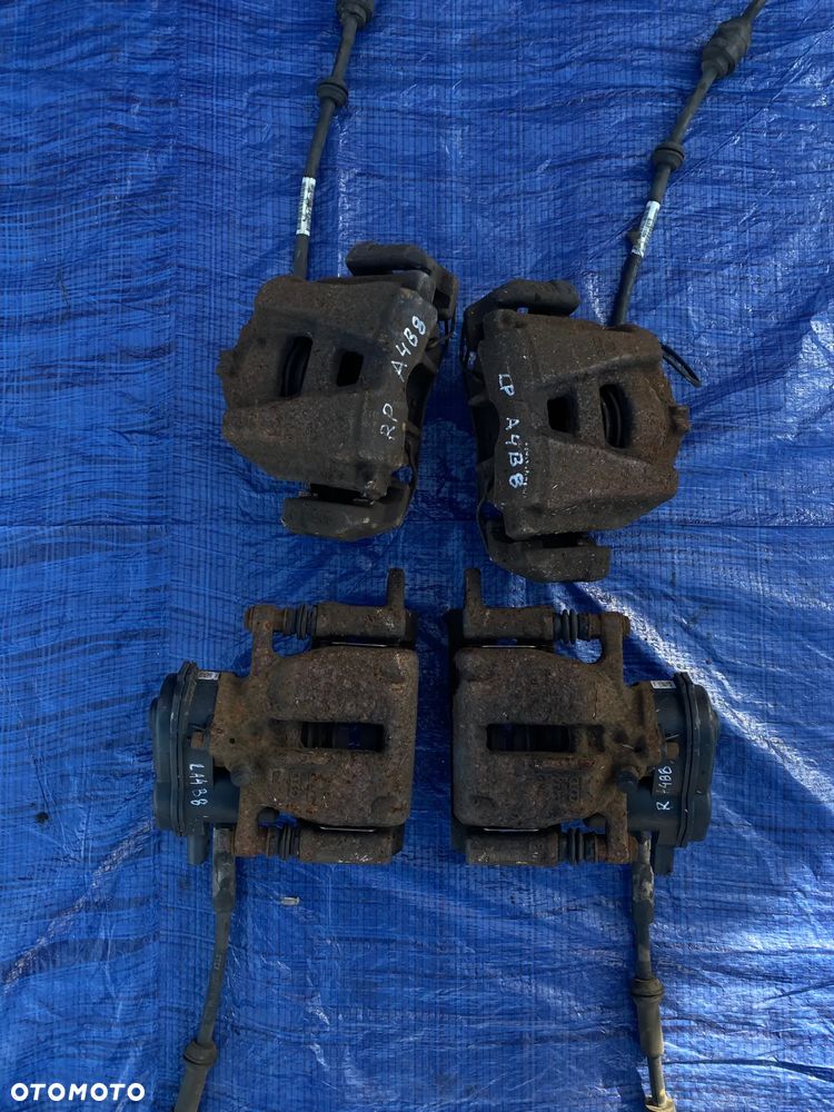 AUDI A4 B8 A5 8T Q5 2.0 TFSI ZACISK HAMULCOWY LEWY PRAWY TYŁ TYLNY KOMPLET  32335478 - 2