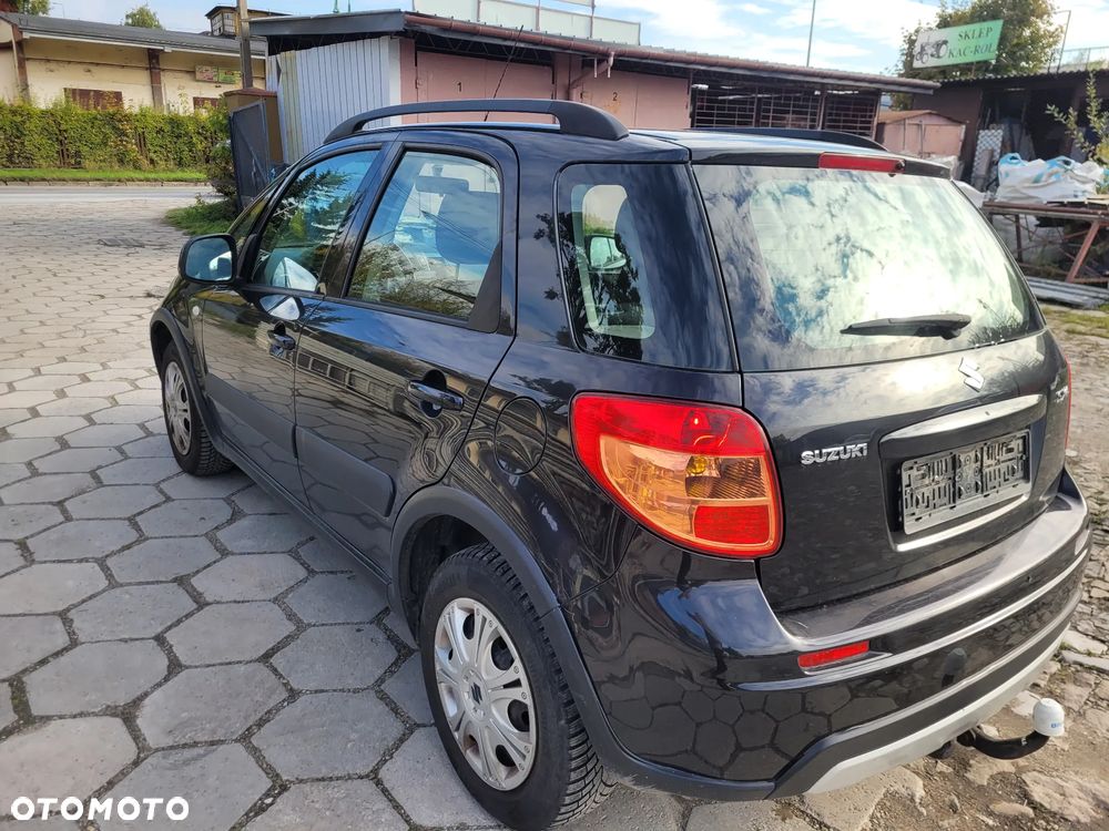 Suzuki SX4 1.6 Comfort Plus - 9