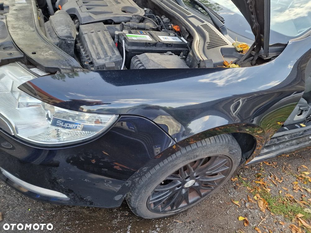 Błotnik  lewy  przód skoda  superb  II  w  kolorze  LF9R - 1