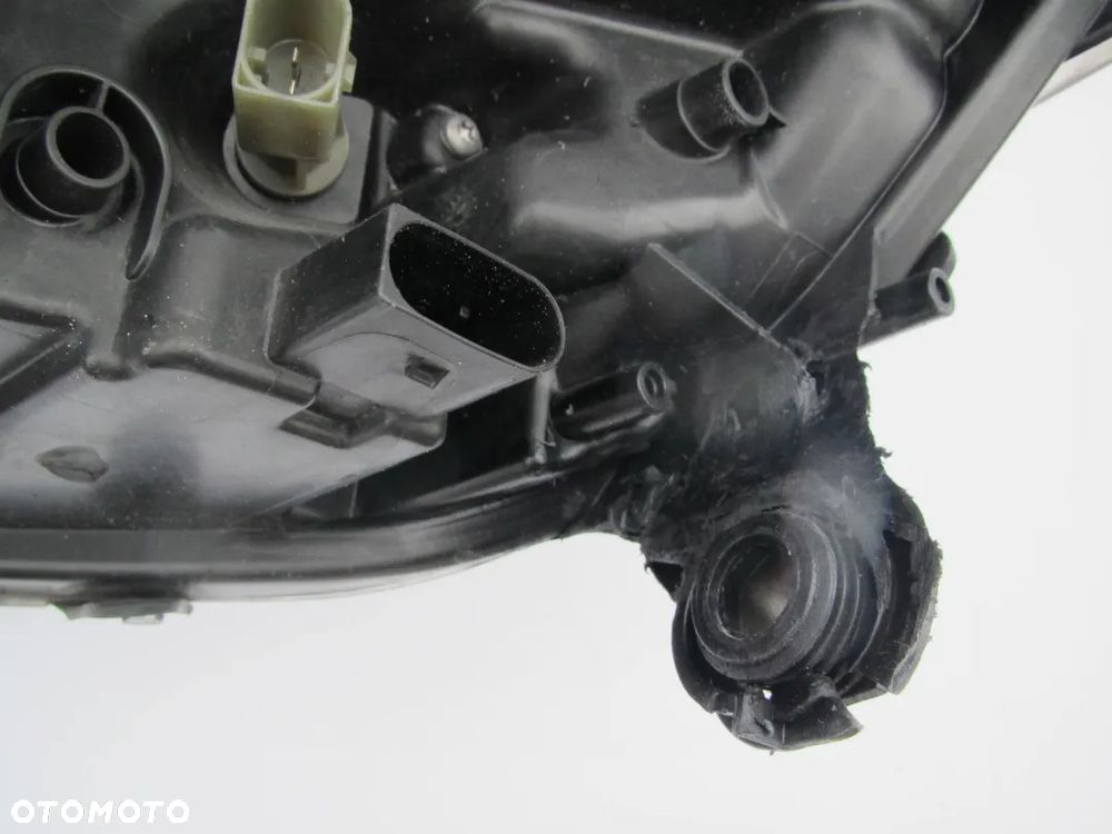 MERCEDES ML W164 2005 - reflektor USA HELLA - 12
