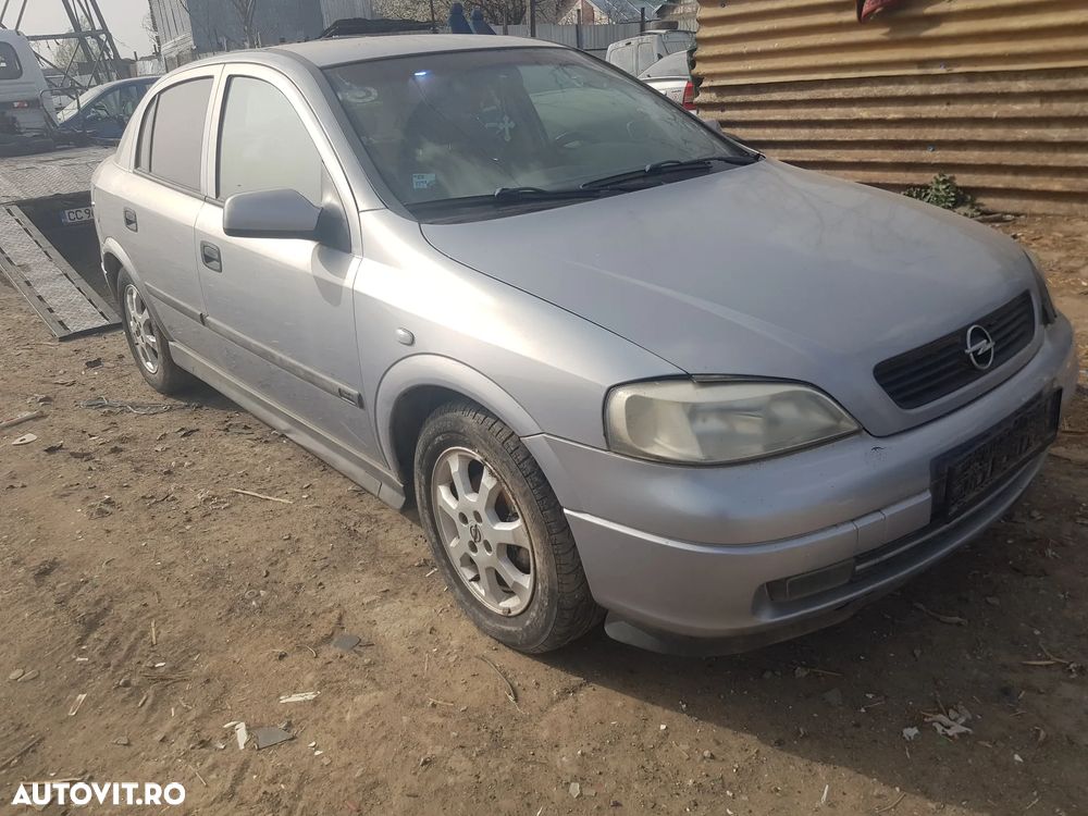 Dezmembrez Opel Astra g - 1