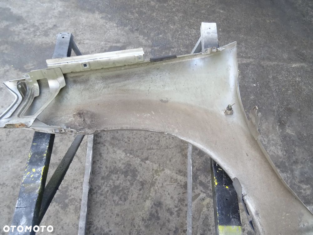 Błotnik Dacia Logan Prawy Przód - 7