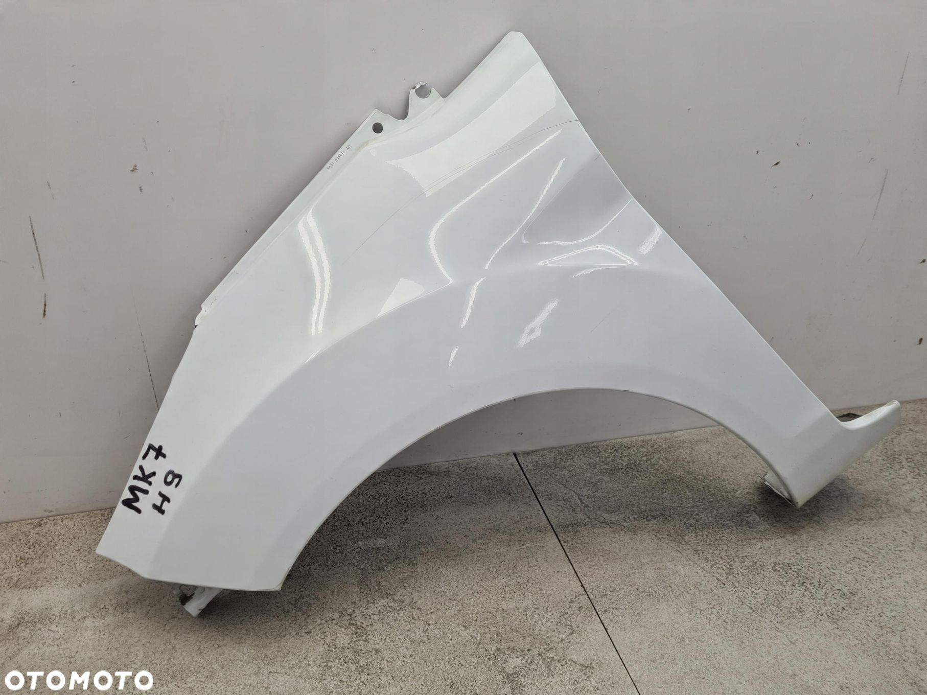 FORD FIESTA MK7 BŁOTNIK LEWY PRZÓD H9 - 1